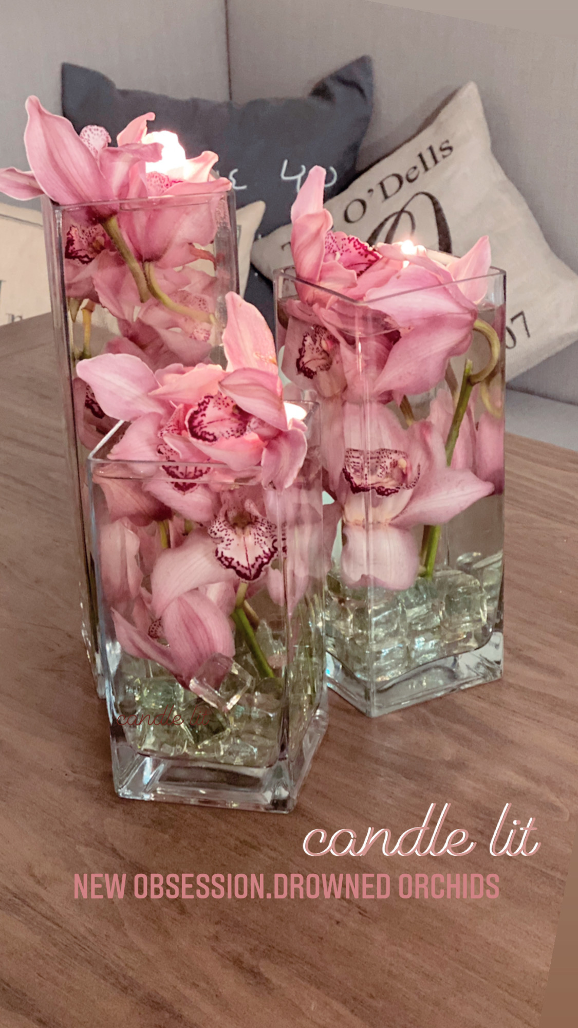 Candle-lit drowned pink orchids